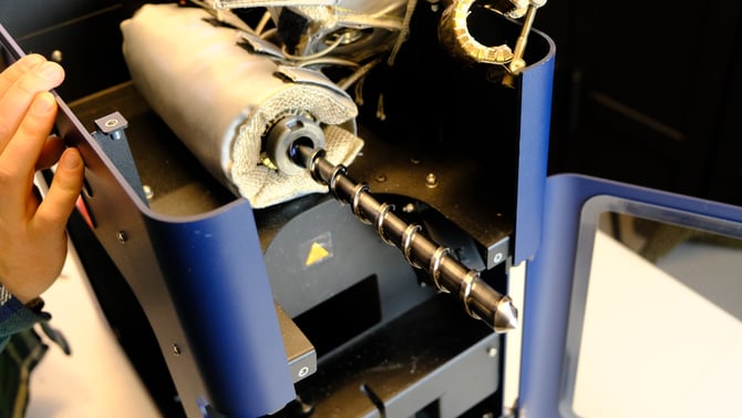 Place screw back in from front